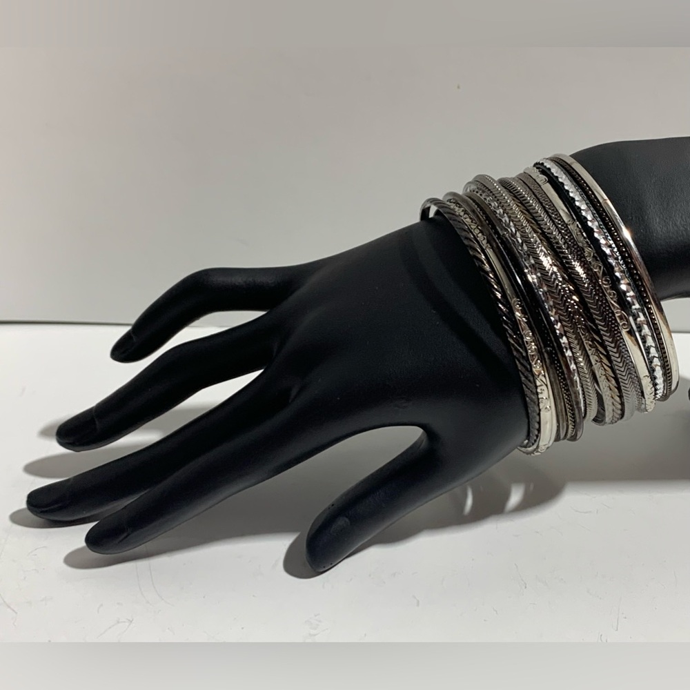 Group of silver bangle bracelets